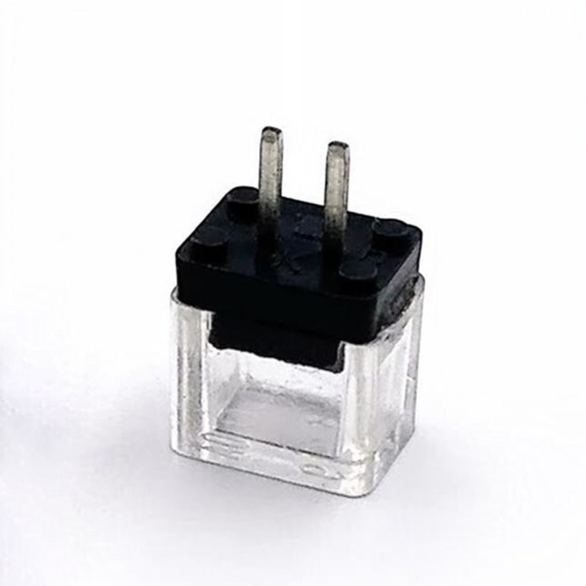 JJAutomation Fanuc A03B-0815-K002 CNC fuse with a clear plastic housing and black top connector pins.