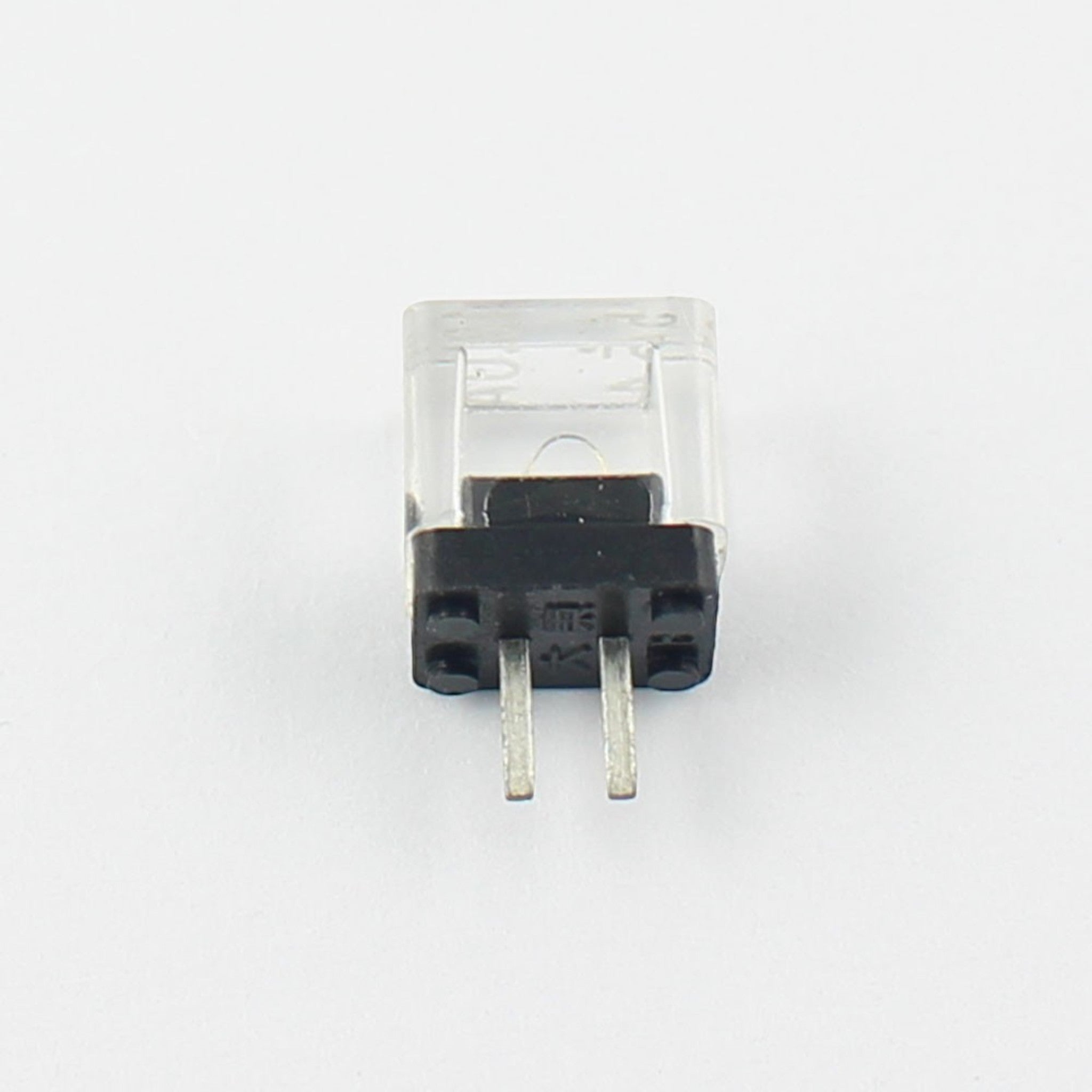 JJAutomation Fanuc A03B-0815-K002 CNC fuse with a clear plastic housing and two metal pins for industrial machinery.