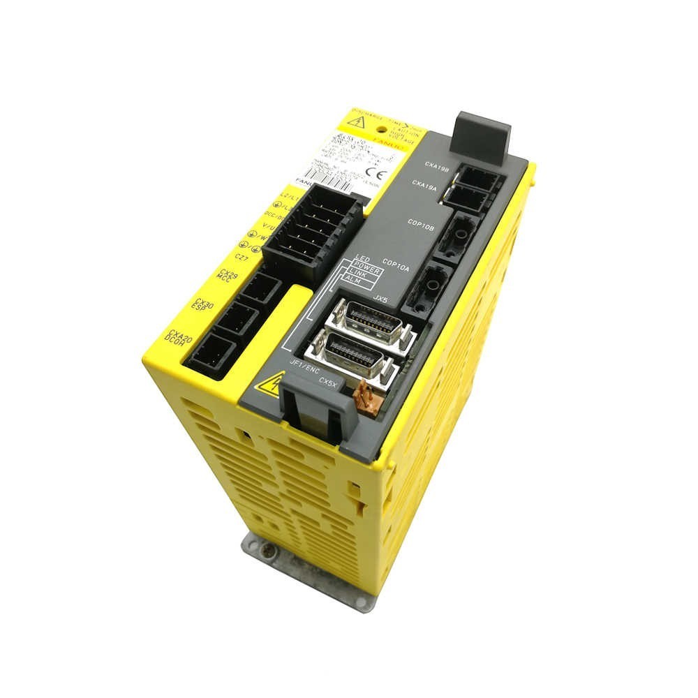 JJAutomation yellow FANUC industrial servo amplifier module with labeled ports for CNC and robotic machinery control.