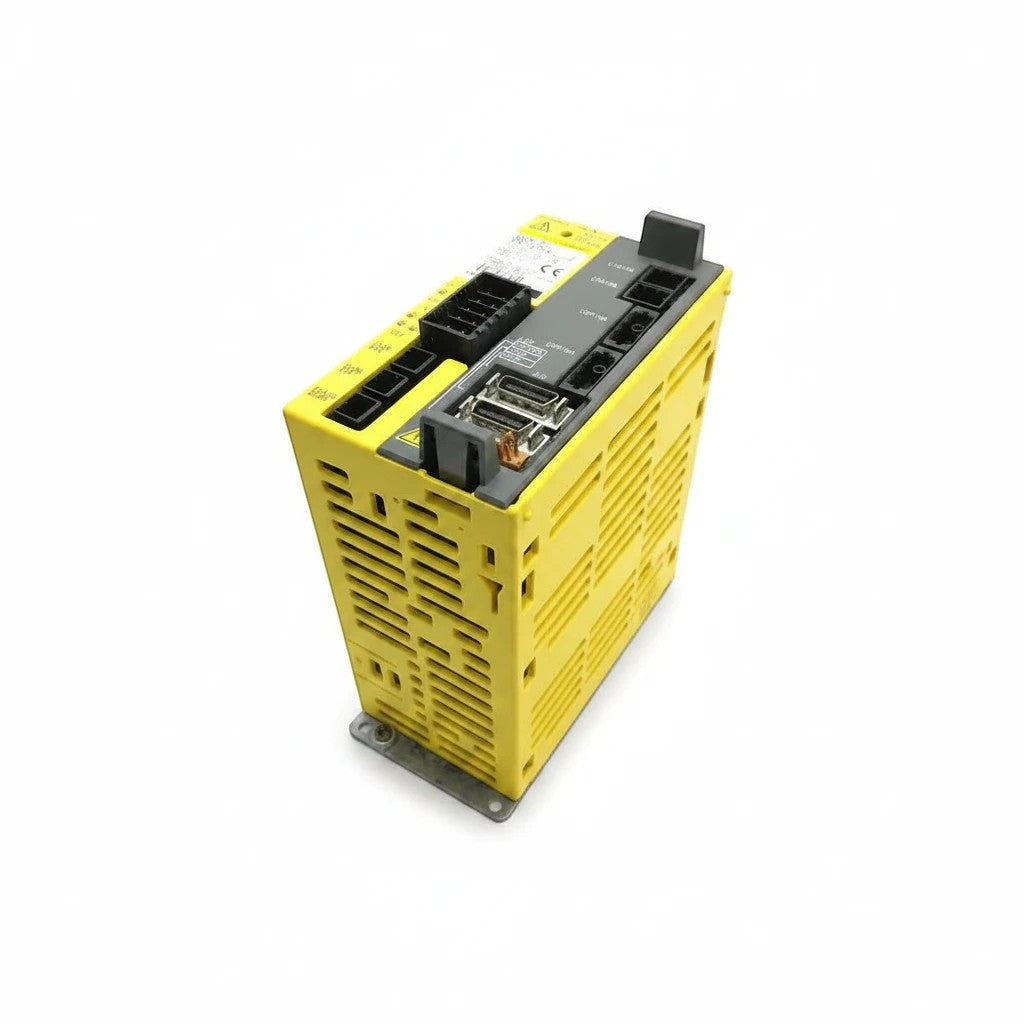 JJAutomation yellow FANUC industrial servo amplifier module for CNC machinery and robotic arm control systems.