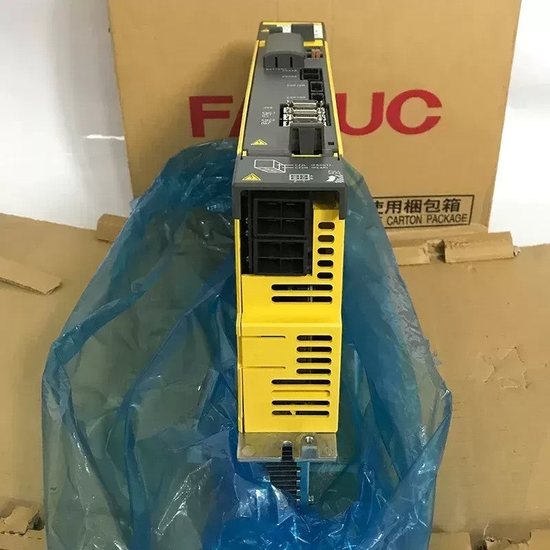 JJAutomation Fanuc Alpha i SVM2-40/40i dual-axis servo amplifier module in yellow and grey housing.